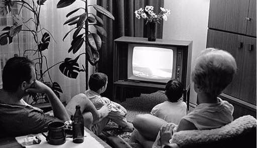 Family watching television in the past