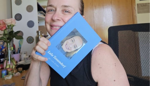 Woman showing her life story book